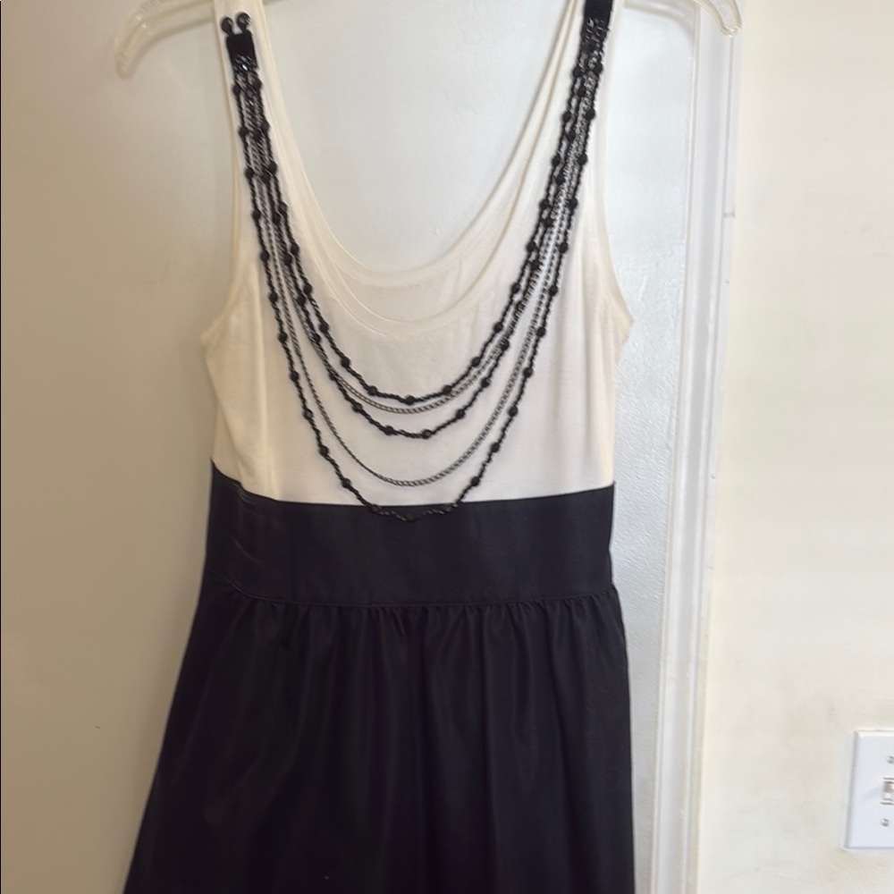 Elegant Black and White Dress with Beaded Detail